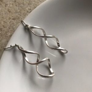 Beautiful non-shiny silver swirl earrings